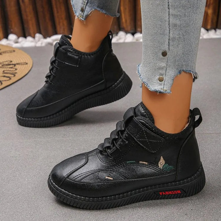 Women's black velvet house shoes with hollow-out design and rubber sole
