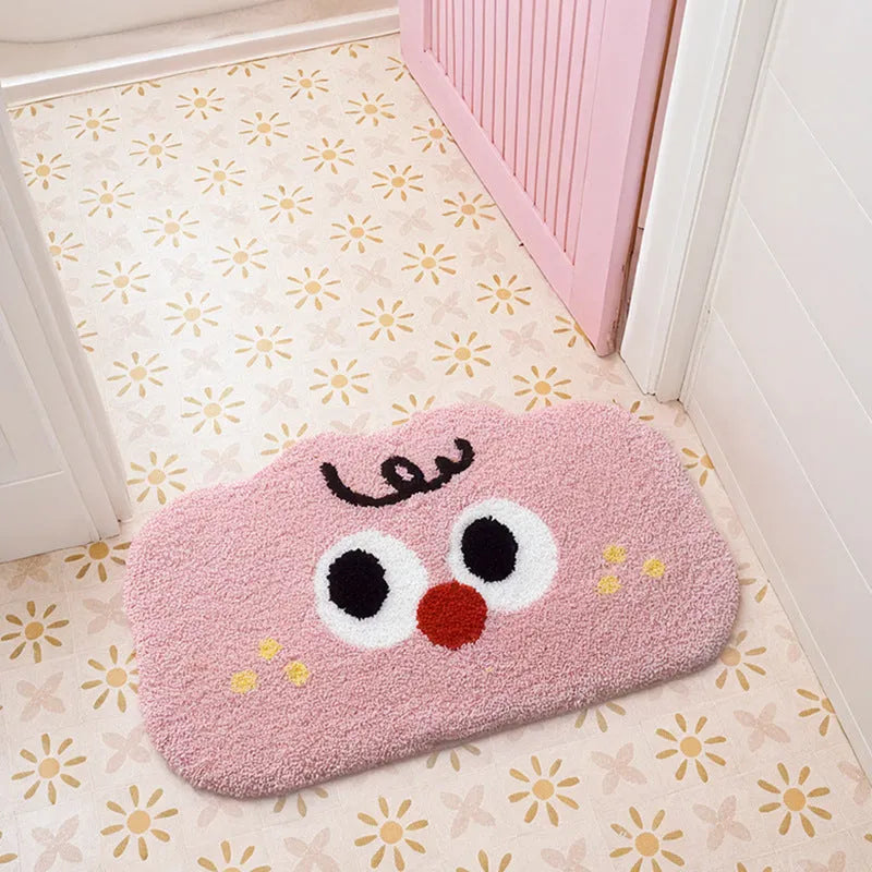 Big Eye Clouds cartoon anime bathroom mat in soft green, shown on a tiled bathroom floor.