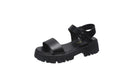 Women's beige peep toe ankle strap platform sandals with buckle fastening on wooden floor