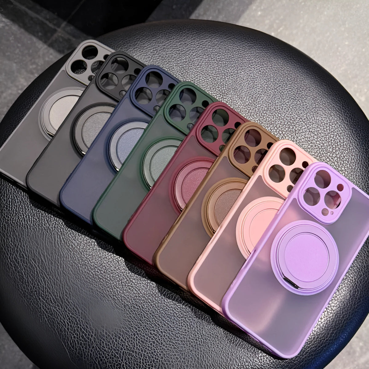 Magnetic suction pivot phone case for iPhone, black colour, with visible stand bracket and frosted finish