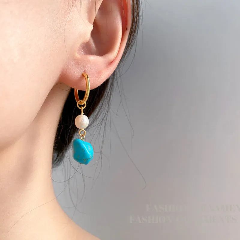 Copper geometric earring set with irregular turquoise stones and cultured pearls, showing both short and dangle drop styles.