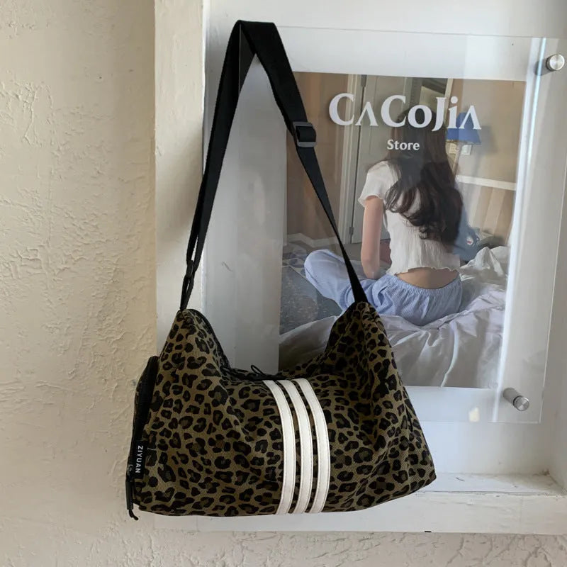 Large capacity leopard print crossbody shoulder bag with sports style stitching details