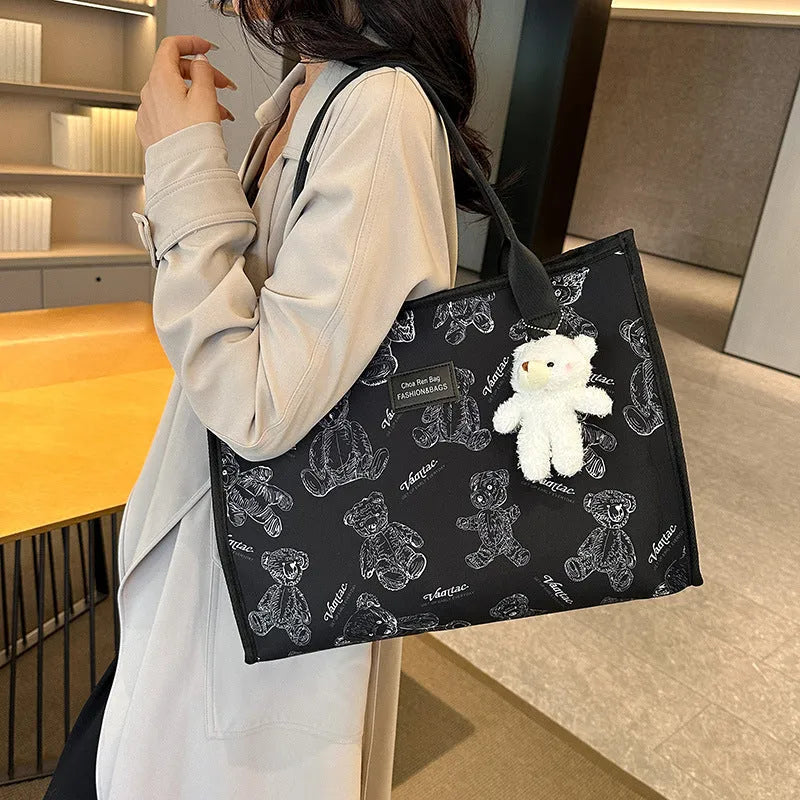 Women's canvas tote bag with diamond pattern design showing black and white colour options
