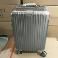 Alloy trolley case luggage in solid colour for business travel with metal construction and universal wheels