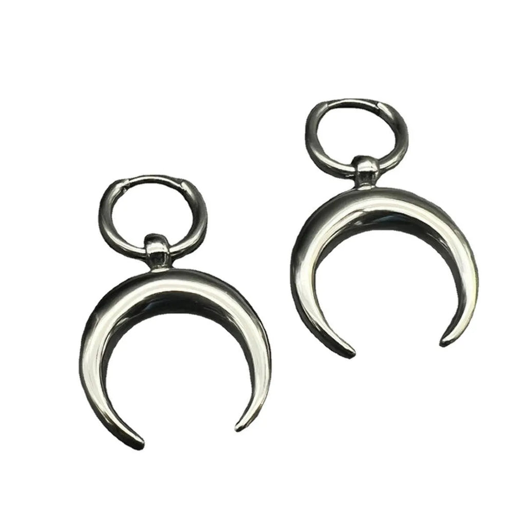 Silver big hoop earrings with a geometric shape and gothic moon design.