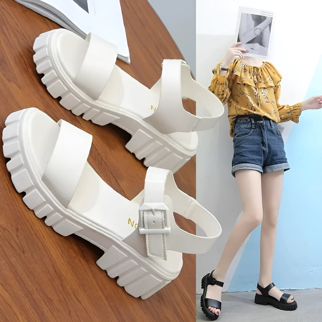 Women's beige peep toe ankle strap platform sandals with buckle fastening on wooden floor