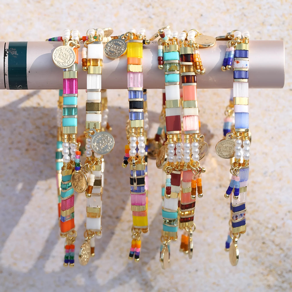 Women's handcrafted imitation pearl beaded bracelet showing European American styling
