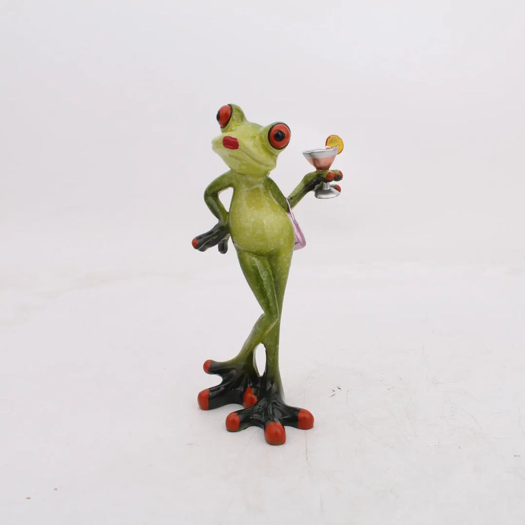 Pastoral style synthetic resin frog ornament for home decoration on a wooden shelf.