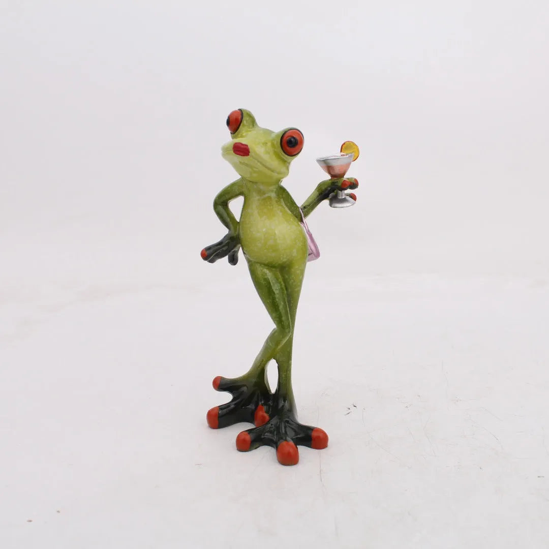 Pastoral style synthetic resin frog ornament for home decoration on a wooden shelf.