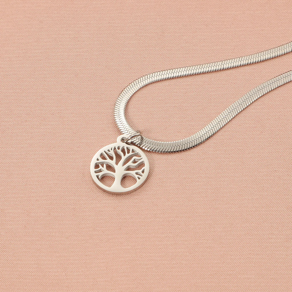 Stainless steel lucky tree pendant necklace on a snake bones chain, shown in gold and steel colour options.