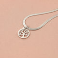 Stainless steel lucky tree pendant necklace on a snake bones chain, shown in gold and steel colour options.