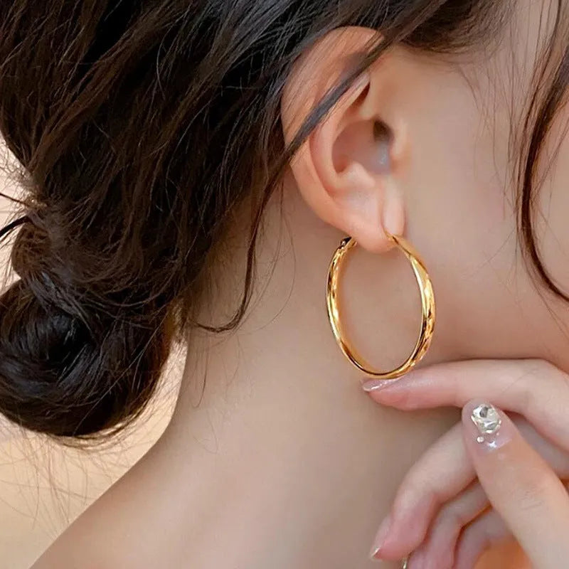 40mm circular copper hoop earrings with electroplated gold and silver colour finishes