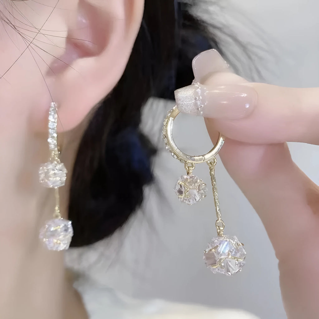 Silver tone rhinestone tassel ball drop earrings with double pendant design
