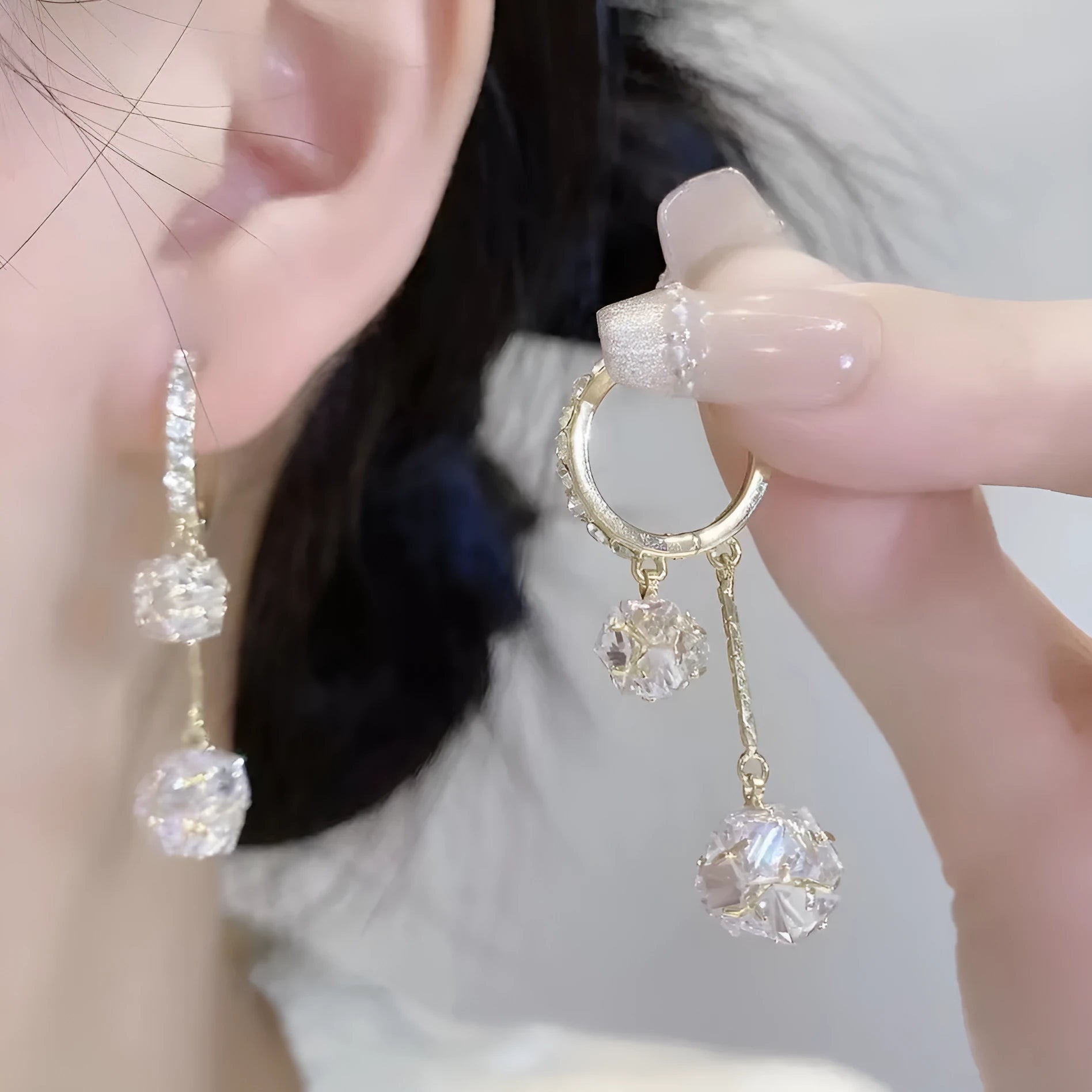 Silver tone rhinestone tassel ball drop earrings with double pendant design