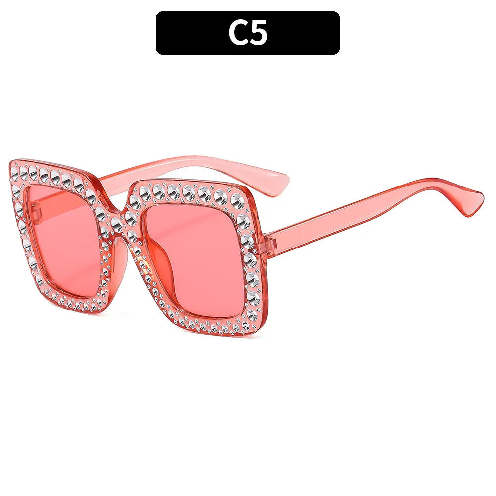 Plastic fashion sunglasses with personality styling in various colour combinations for sun protection