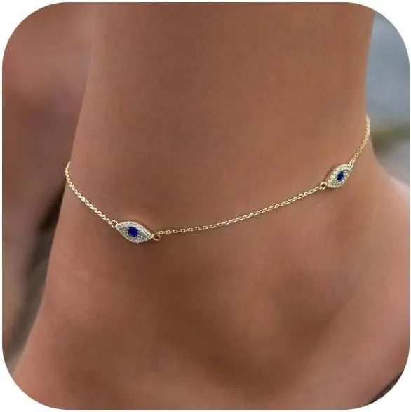 Gold alloy adjustable jeweled pendant anklet on ankle for summer casual wear
