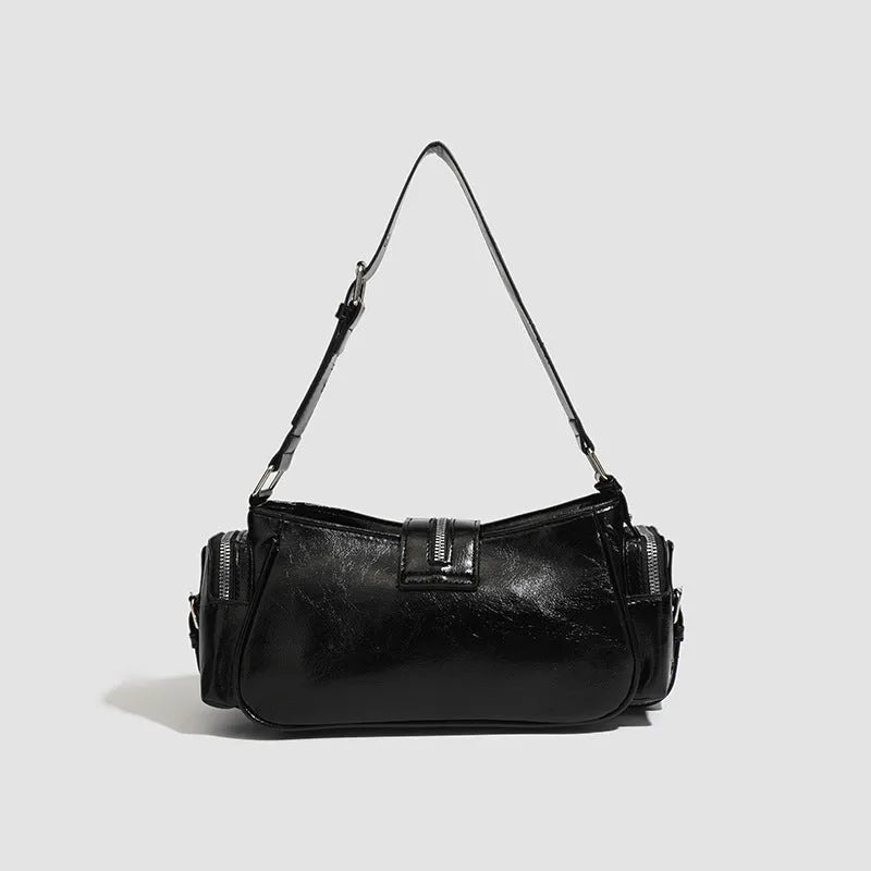 Black retro dumpling-shaped women's handbag with oil wax leather finish and external pockets