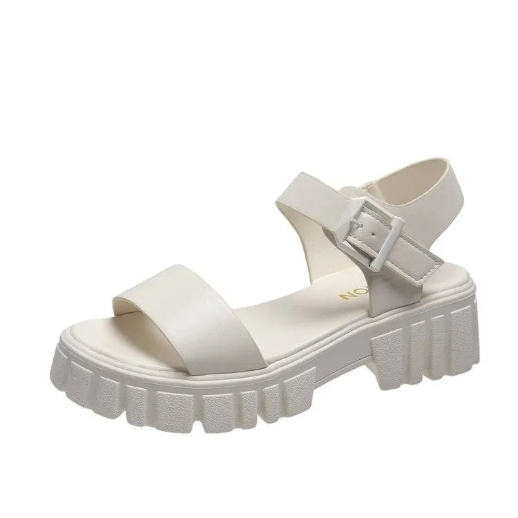 Women's beige peep toe ankle strap platform sandals with buckle fastening on wooden floor