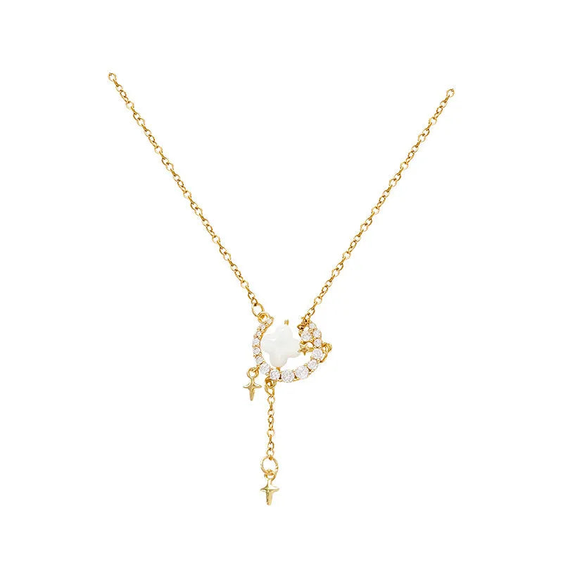 Gold star moon zirconium necklace on adjustable copper chain with celestial pendant design