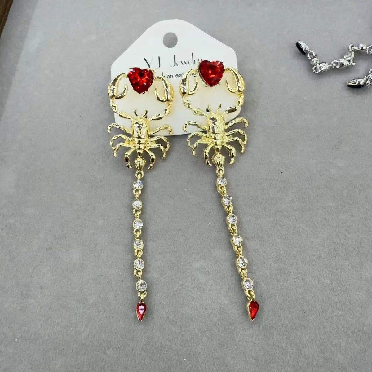 Exaggerated facial features asymmetric earrings for women in gold, alloy electroplated insect style