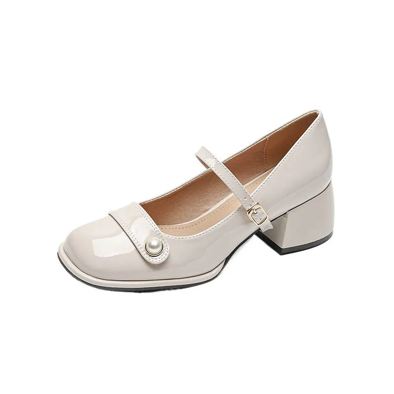 Womens mid-top patent leather ankle boots with a square toe and chunky block heel in apricot colour.