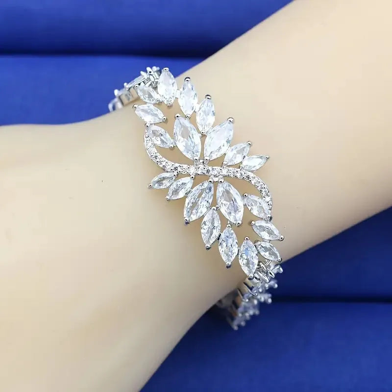 Gold plated copper bracelet with micro inlaid zircon ice flower design in blue, colour, green, purple or white