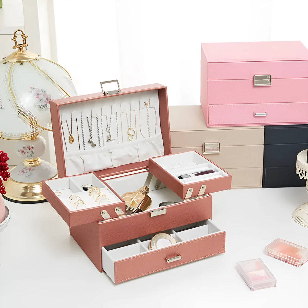 Hard black PU leather jewellery storage box with organised compartments for rings and necklaces.