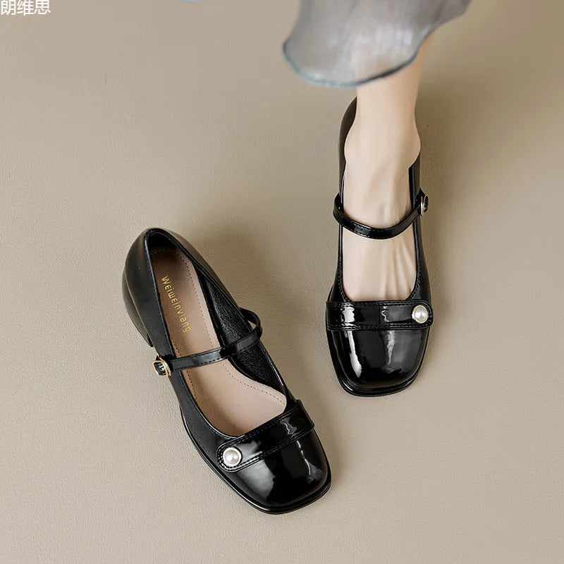 Womens mid-top patent leather ankle boots with a square toe and chunky block heel in apricot colour.