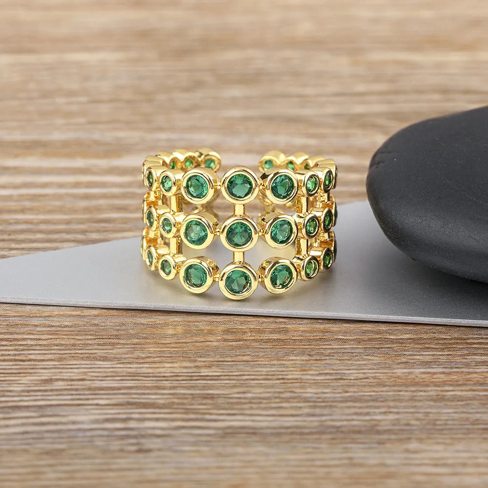 Copper ring with 18K gold plating and green zircon stones in three-layer exaggerated wide design