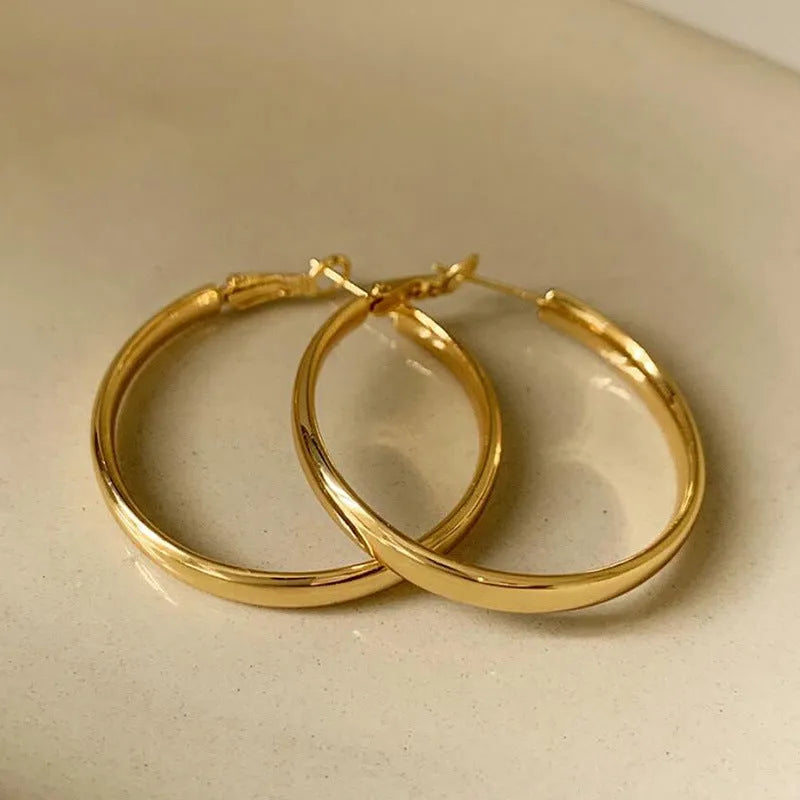 40mm circular copper hoop earrings with electroplated gold and silver colour finishes
