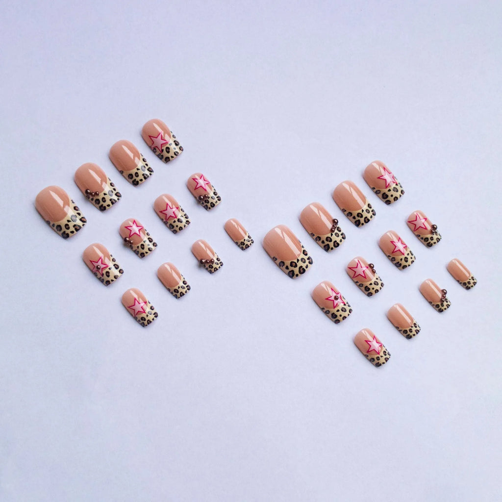 Leopard print French manicure nail art stickers with rhinestone pearls and metallic five-pointed star accessories