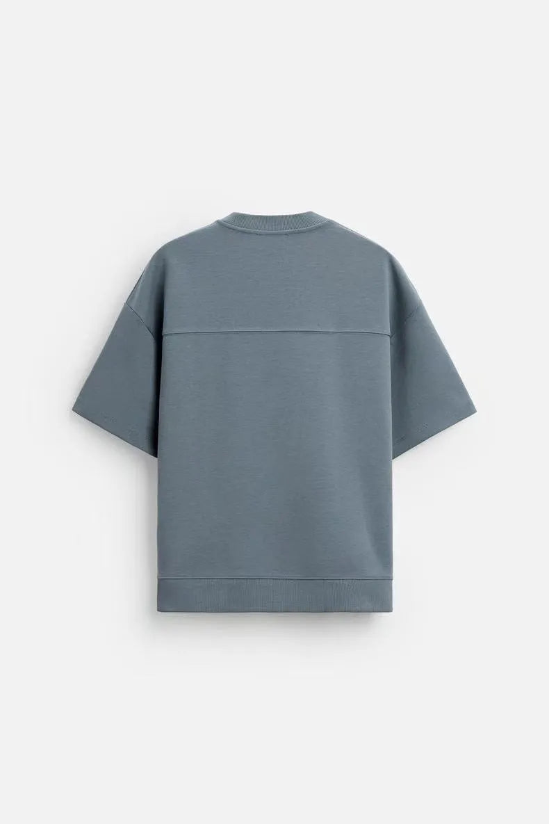 Loose double-sided texture polyester top and matching shorts casual set shown in blue.