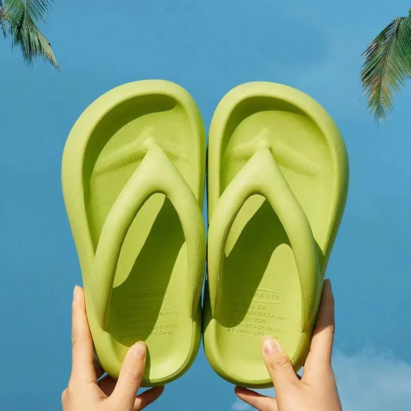 Women's solid colour EVA flip-flops with thick sole and decorative bow.