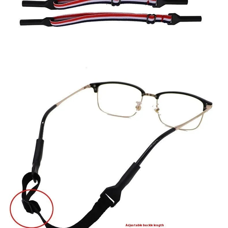 Black adjustable glasses cord strap with silicone earpiece ends shown on spectacles