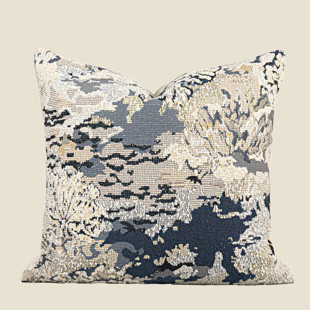 Antique blue decorative pillow with abstract flower pattern, shown in square and waist pillow sizes.