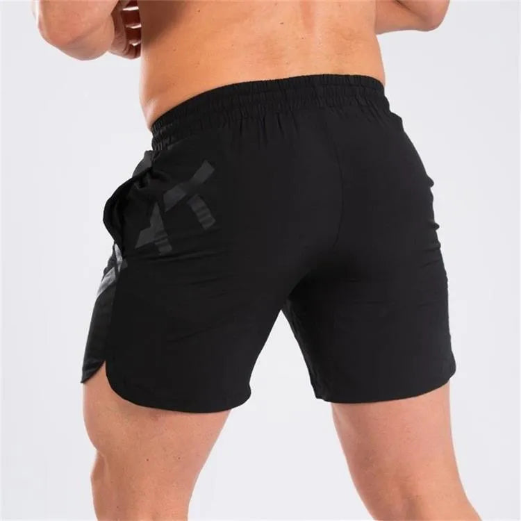 Men's elastic running shorts in black with quick-drying fabric and knee-length design