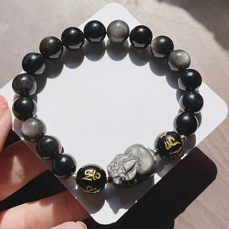 Men's silver stone beaded bracelet with Chinese style and engraved proverbs on a dark background.