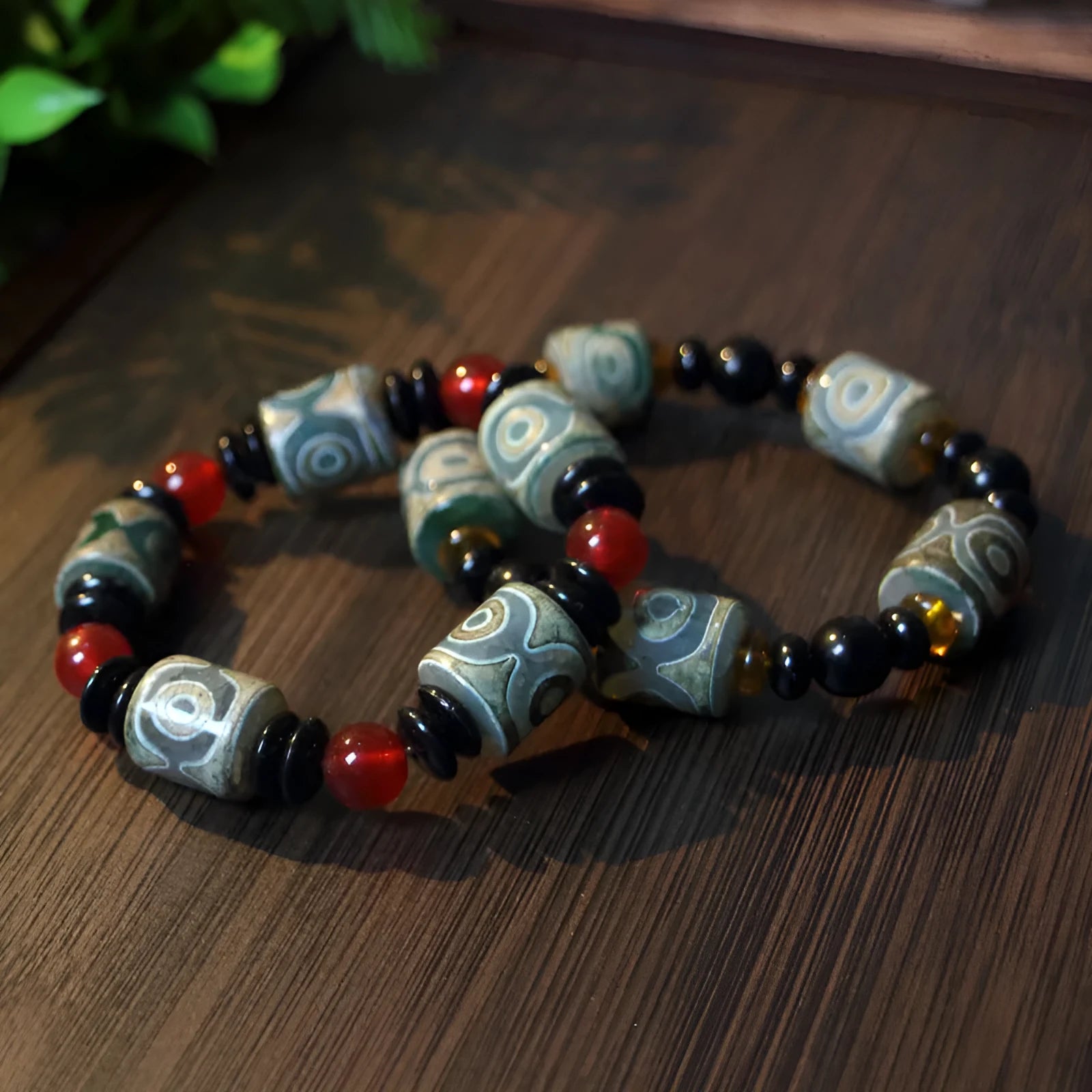 Distressed agate Tibet beads bracelet with three eye dzi design and polished stone beads