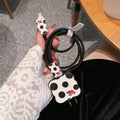 Cartoon puppy patterned lambskin protective sleeve for a USB fast-charging plug.