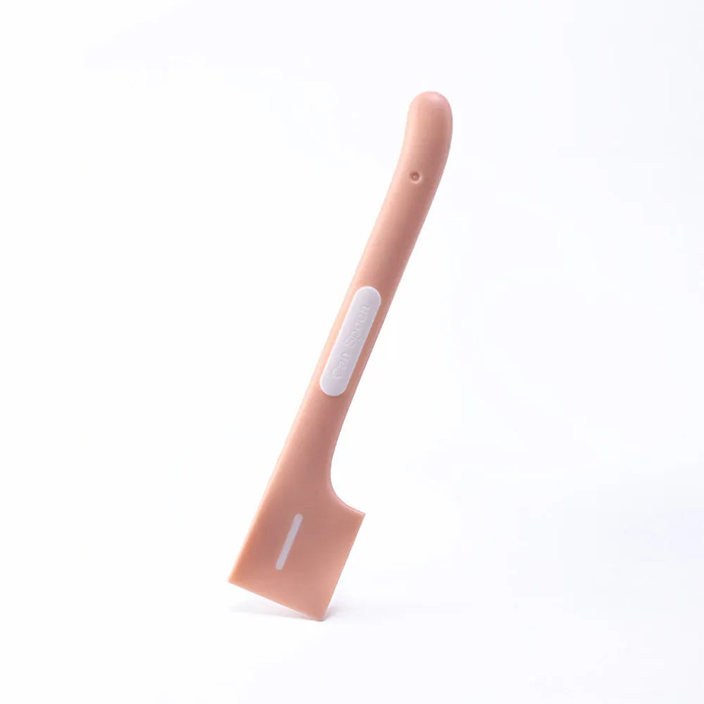 Green long-handled pet food spoon with right-angle head for scraping canned wet food.