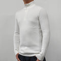 A man's grey half-turtleneck zip-up sweater with long sleeves, shown on a hanger.