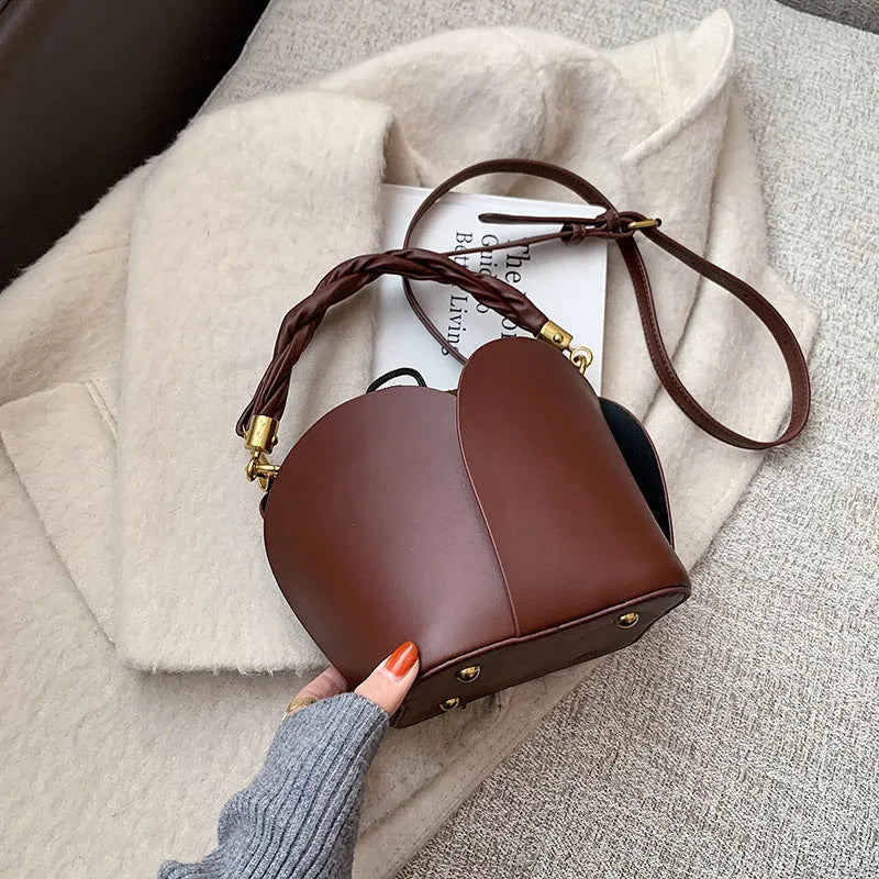 Women's small PU retro bucket bag in apricot with single shoulder strap and soft handle