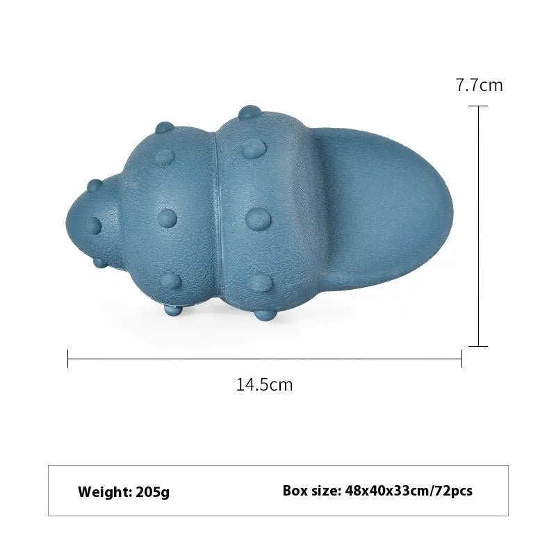 Blue rubber shark-shaped dog toy with a hidden food compartment for interactive chewing and feeding.