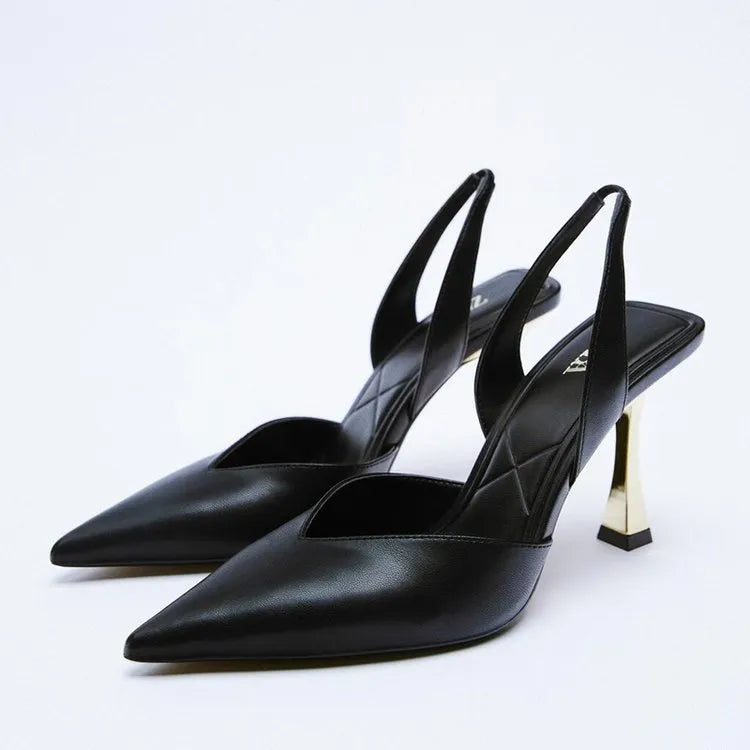 Nude patent leather pointed high heel shoe with shallow mouth, shown in apricot colour.