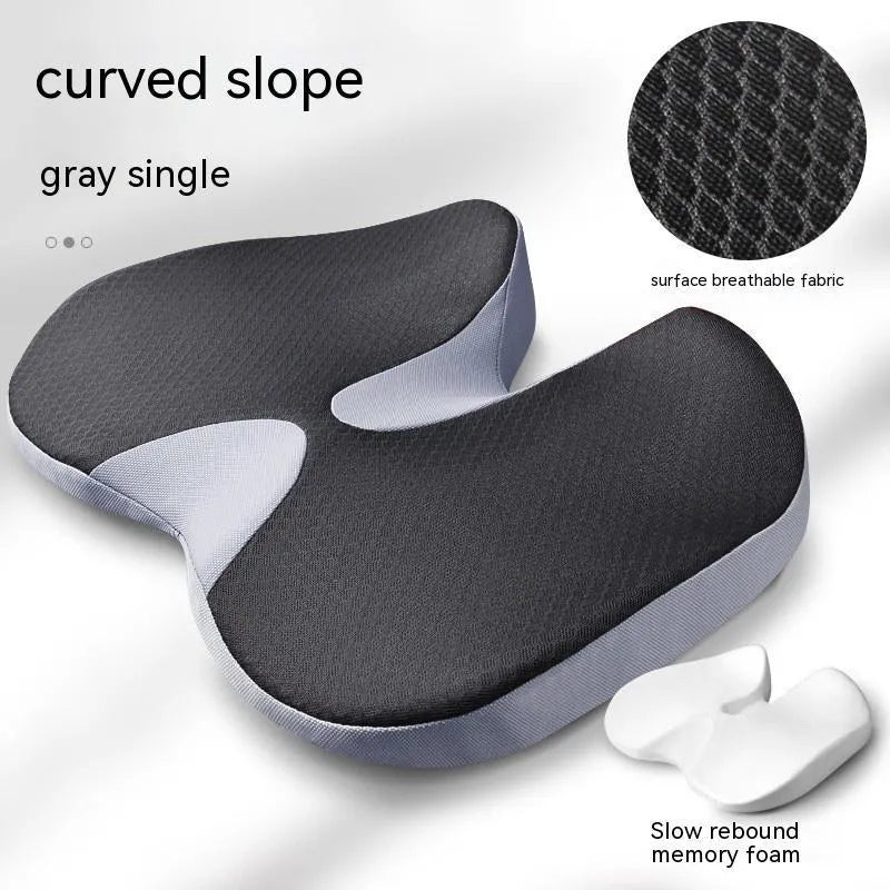 Curved memory foam seat cushion in beige with bevel design for tailbone support