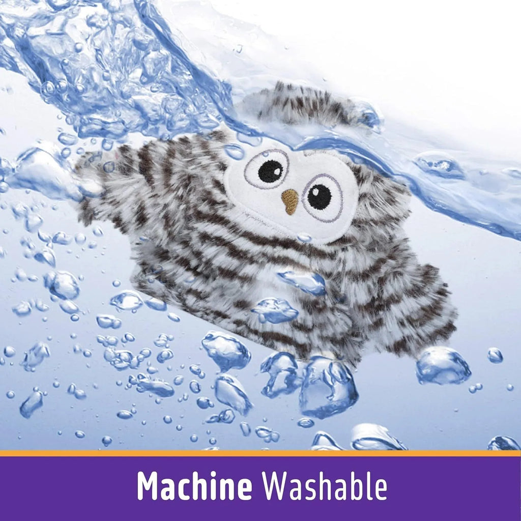 Grey automatic chirping owl cat toy with flapping wings on a floor.