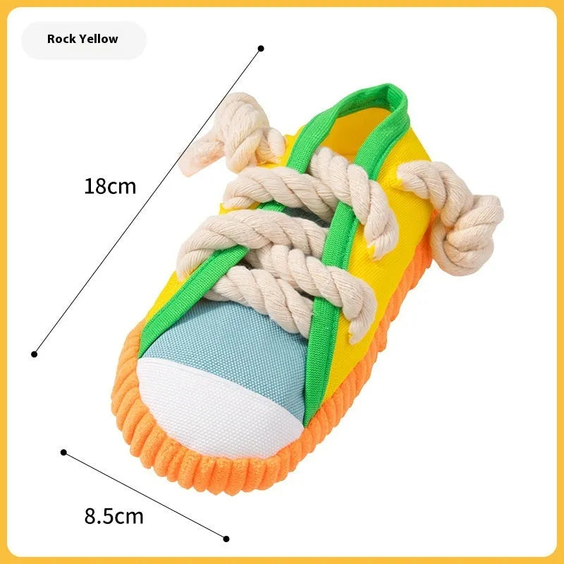 Plastic dog chewing toy with slippers design in choice of three colours for molar relief