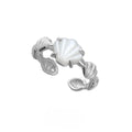 Adjustable silver ring featuring a carved shell and tiger eye stone design in a choice of finishes.