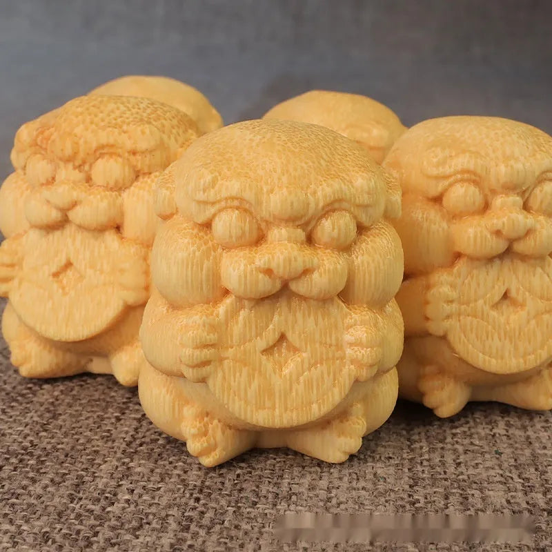 Carved bamboo ornament with take money design, 4.5cm tall with 3.5cm diameter base