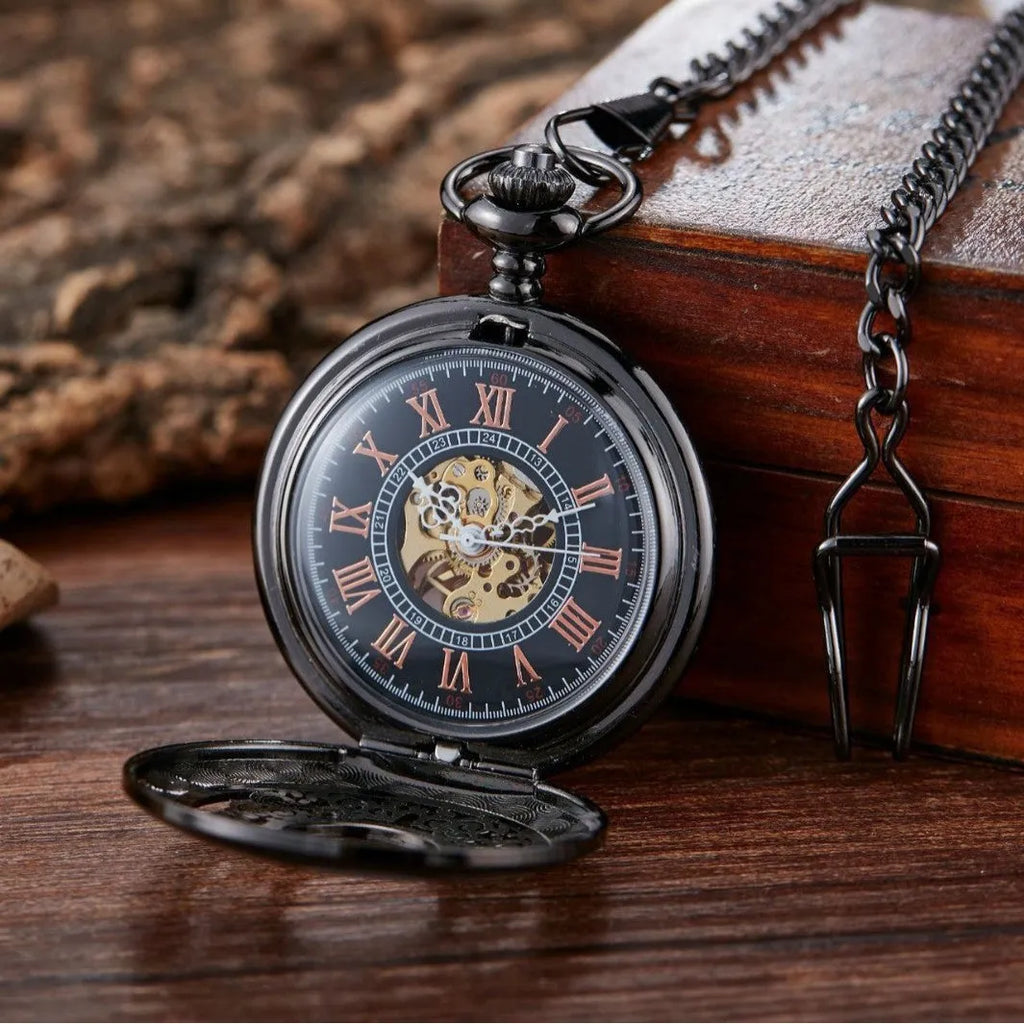 Retro automatic mechanical pocket watch with floral print dial and transparent back in gold colour.